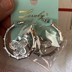 And Lovely Earrings, Silver Tone, hoop with butterfly, 1.5” Diameter